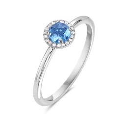 Blue Topaz And Diamond Halo Ring