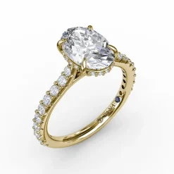 Classic Oval Diamond Solitaire Engagement Ring With Hidden Pavé Halo