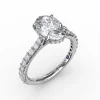 Classic Oval Diamond Solitaire Engagement Ring With Hidden Pavé Halo
