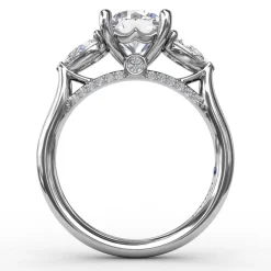 Classic Three-Stone Engagement Ring With Pear-Shape Side Diamonds