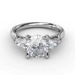 Classic Three-Stone Engagement Ring With Pear-Shape Side Diamonds