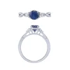 14K White Gold Sapphire And Diamond Ring With Twist Sides