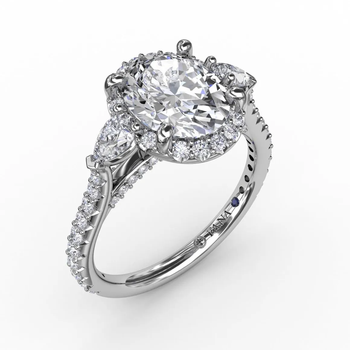 Oval Diamond Halo Engagement Ring With Pear-Shape Diamond Side Stones